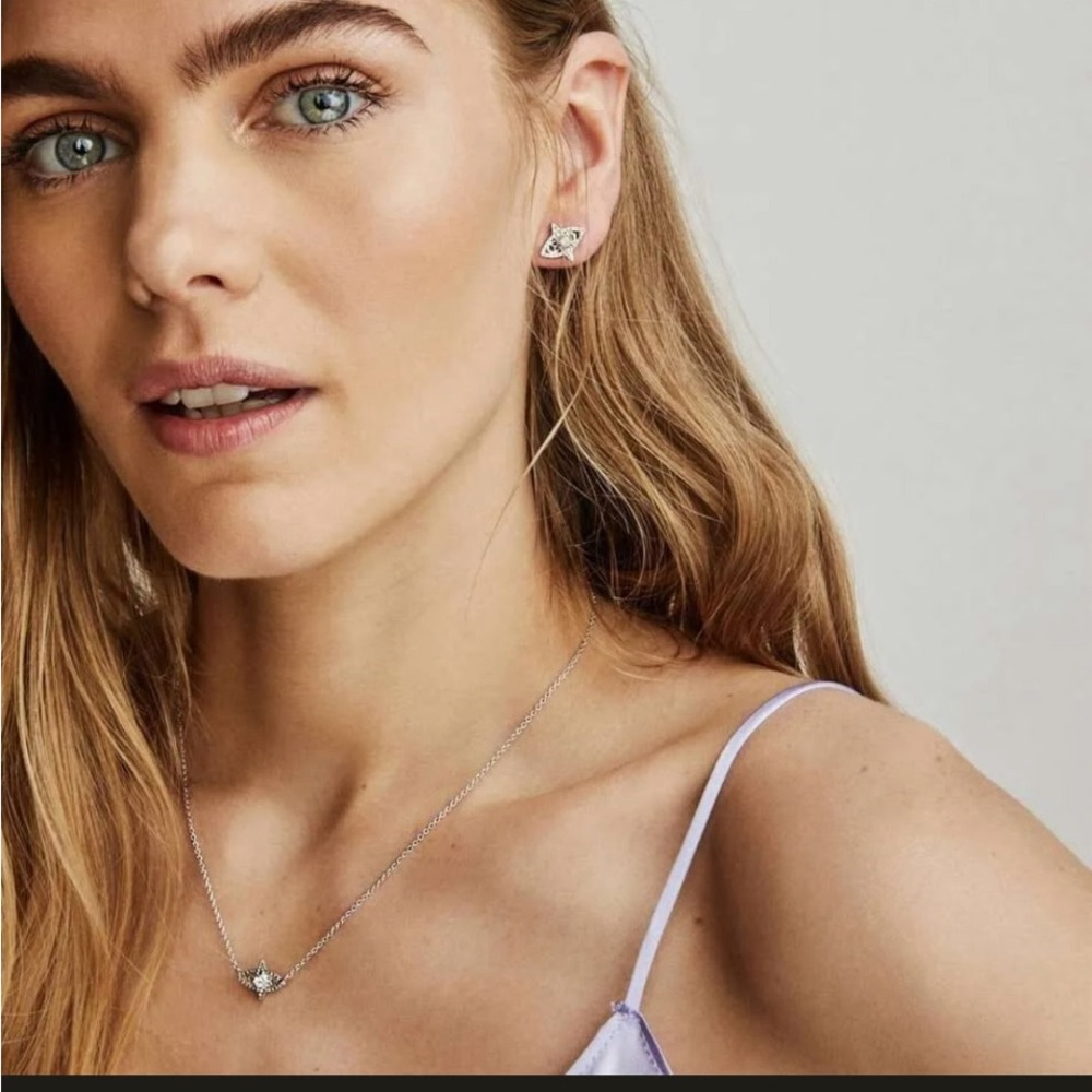 Kendra Scott gold Caleb necklace.